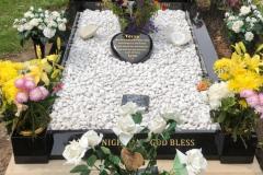 Granite headstone in cemetery