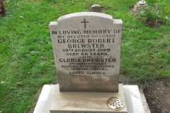 Sandstone gravestone on white base — In Loving Memory of George Robert and Eugenia Webster