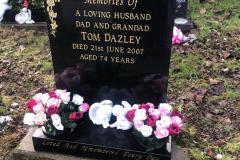 Granite headstone — Tom Dazley, beloved husband and father