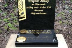 Churchyard gravestone — Daphne Volley, beloved wife and mother