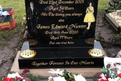 Black granite religious memorial with gold engraving and flowers — Together Forever In Our Hearts