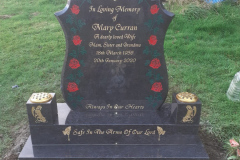 Dark slate religious memorial with rose emblems — Mary Carron, Rest In The Arms Of Love
