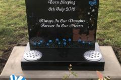 Black granite children's headstone — Born Sleeping 6th July 2010, Always In Our Thoughts, Forever In Our Hearts