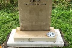 Weathered sandstone memorial marker — Jones 18.3.1935 - 28.7.2018